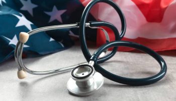 USA Flag and Stethoscope Representing Healthcare and Medical Services in the United States